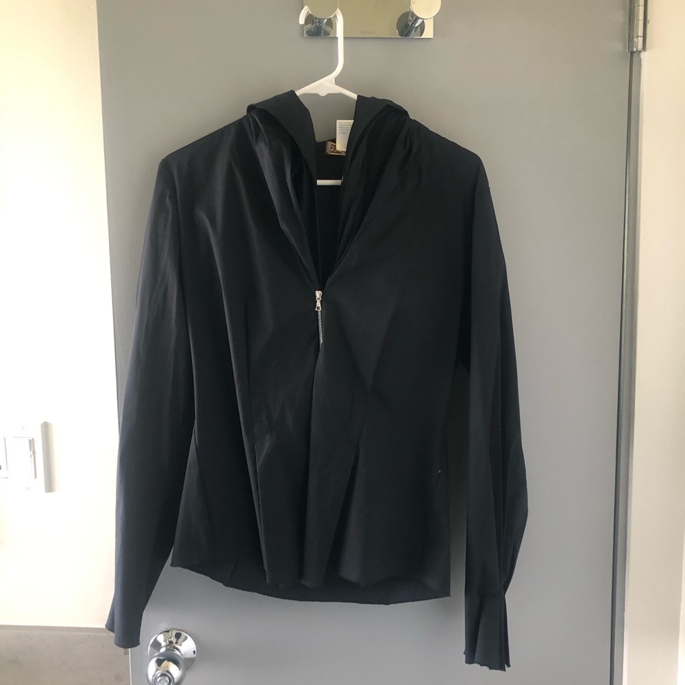 AXEL’S (Vail, Colorado) black hooded blouse